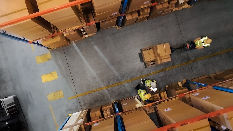 Industry warehouse photo showing business impact